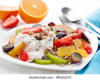 Plate Of Fruit And Berries Salad With Yogurt