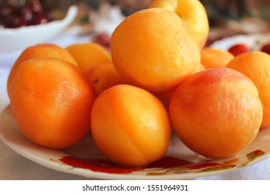 A Plate Full Of Juicy Apricots