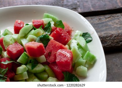 A Plate Full Of Mint, Watermelon And Cucumber Salad