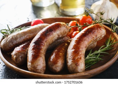 Plate Of German Bratwurst Sausages With Herbs