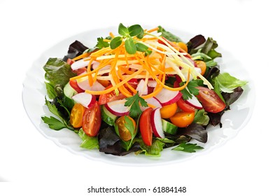 Plate Of Healthy Green Garden Salad With Fresh Vegetables On White Background