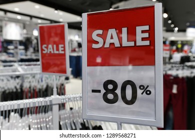 plate with information about sale and discount in interior of the store - Shutterstock ID 1289568271