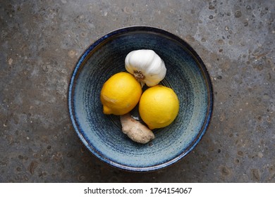 Plate With Lemon, Garlic And Ginger