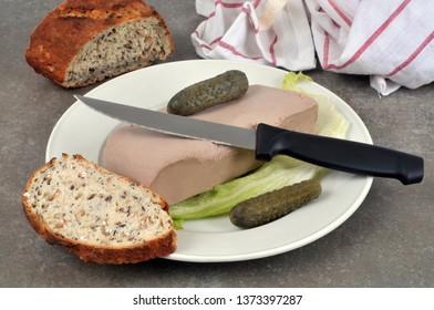 Plate Of Liver Pâté With Pickles And Bread