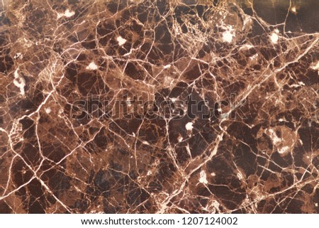 The plate is made of marble of brownish-white shades. Smooth texture for design and decoration. Natural building material. Natural patterns on the stone. Plates for floor and walls.