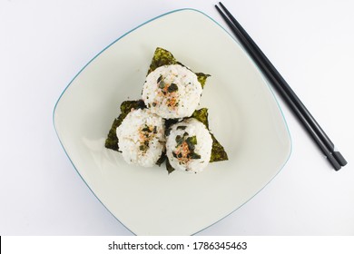 A Plate Of Onigiri With Furikake In White Background. 