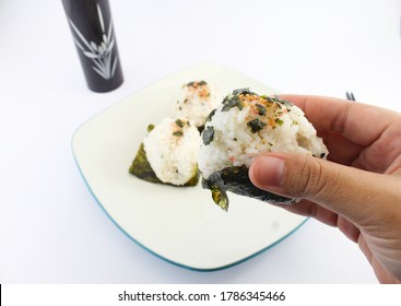 A Plate Of Onigiri With Furikake In White Background. 