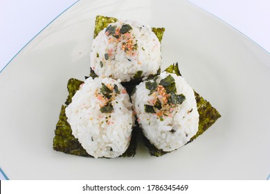 A Plate Of Onigiri With Furikake In White Background. 