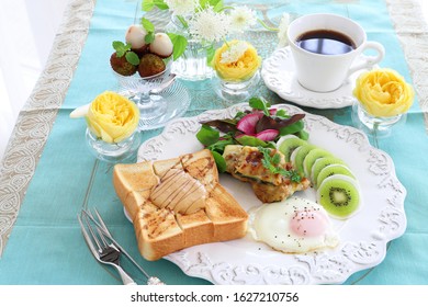 Plate Of Peanut Butter Toast,fried Egg,stuffed Zucchini, And Turnip Kiwi Carpaccio