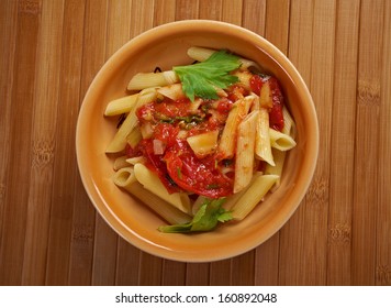 Plate Of Penne Rigata Pasta With Marinara Sauce .farm-style