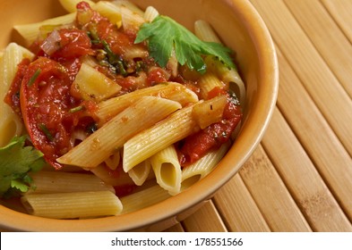 Plate Of Penne Rigata Pasta With Marinara Sauce .farm-style