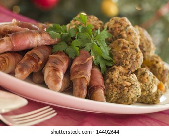 Plate Of Pigs In Blankets And Chestnut Stuffing Balls