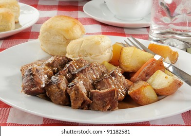 A Plate Of Pot Roast With Autumn Vegetables