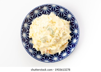 Plate Of Potato Salad On A White Background