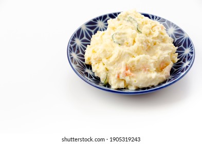 Plate Of Potato Salad On A White Background