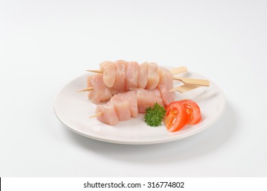 Plate Of Raw Chicken Skewers