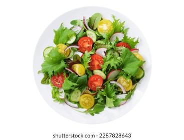 plate of salad with fresh vegetables isolated on white background, top view