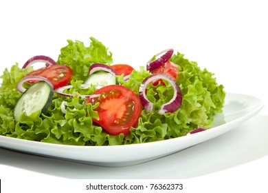 A Plate Of Salad In Side View.