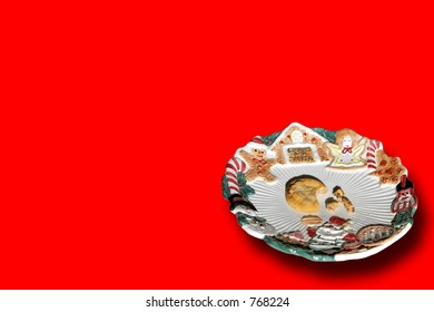 A Plate For Santa's Cookies, And He Left Only One Half-eaten Cookie Left, And Some Crumbs (red Background).