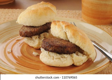 A plate of sausage and homemade biscuits