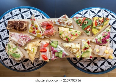 Plate with Scandinavian style open-faced colorful sandwiches.