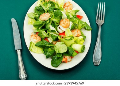 Plate with shrimps salad with green lettuce. Salad of shrimp or prawns. Healthy eating. - Shutterstock ID 2393945769