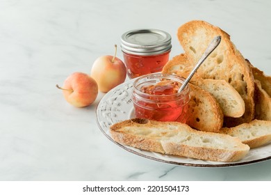 A Plate Of Sourdough Toasted Bread Served With Crab Apple Jelly 