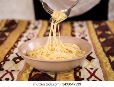 Plate Of Spagetti , Spoon And Fork