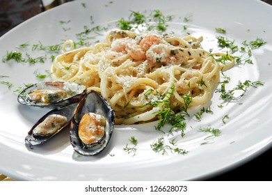 Plate Of Spaghetti Cooked With See Food.