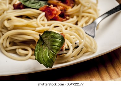plate of spaghetti with fork