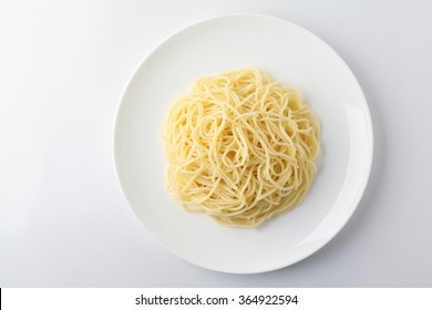 A Plate Of Spaghetti Pasta Isolated On White Background.