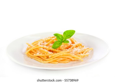 A Plate Of Spaghetti Pasta With Tomato Sauce And A Basil Leaf; Isolated On White Background