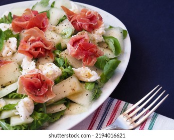 Plate With Spinach, Mozzarella, Jamon And Melon Salad, Vintage Fork. Flat Lay.