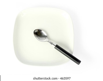 plate with spoon on top