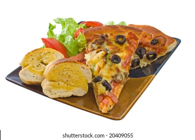 Plate Of Supreme Pizza, Salad And Garlic Bread Isolated Over White Background