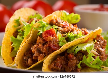 Plate With Taco And Fresh Tomatoes