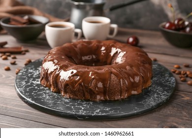 Plate With Tasty Chocolate Cake On Table