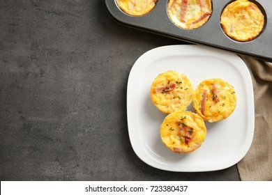 Plate With Tasty Egg Muffins On Table