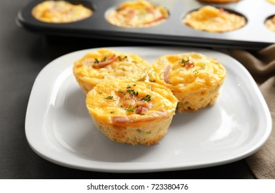 Plate With Tasty Egg Muffins On Table