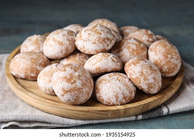 Plate With Tasty Homemade Gingerbread Cookies On Blue Table, Closeup