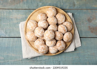 Plate With Tasty Homemade Gingerbread Cookies On Blue Wooden Table, Top View