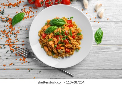 Plate With Tasty Lentil Dish On Table