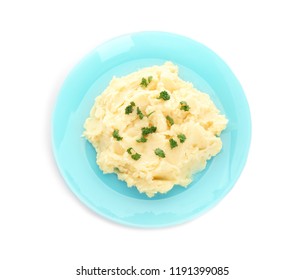 Plate with tasty mashed potatoes on white background, top view