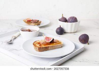 Plate With Tasty Sandwich With Fig Jam On Table