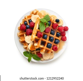 Plate With Tasty Waffles, Fruit And Berries On White Background