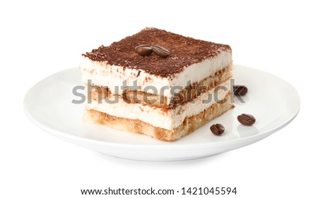 Plate of tiramisu cake isolated on white