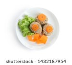 Plate of traditional Passover (Pesach) gefilte fish isolated on white, top view