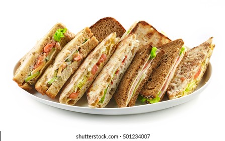 Plate Of Various Triangle Sandwiches Isolated On White Background