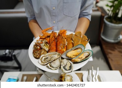 Plate Of Various Types Of Seafood Set, Steamed Rock Lobster, Baby Lobster, New Zealand Mussel, Blue Crab And Fresh Pacific Oyster, Dinner Buffet Seafood Night.