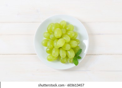 Plate Of White Grapes On White Background